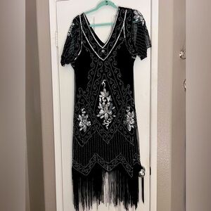 Worm once in great condition, 1920’s era dress. 3x but fits more like a 2x